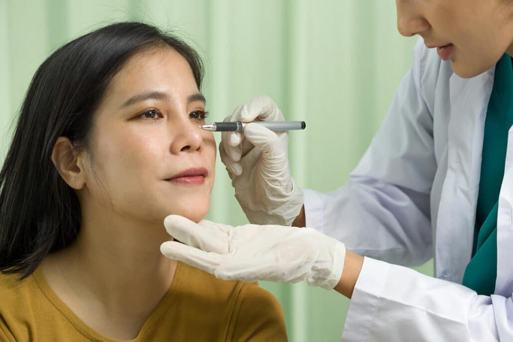 Female asian patient in a liquid rhinoplasty consultation.